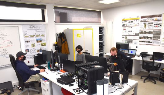 student sitting in computer lab